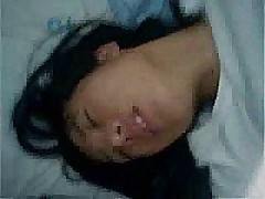 Grainy, shaky and noisy mobile phone video of Korean amateur teen Hye Jin taking her older lovers cock in her hairy pussy and riding him into oblivion while carrying out all precautions proscribed by safe sex regulations.