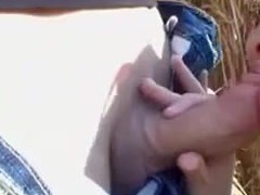 Enjoying the outdoors while fucking and sucking in this public amateur video. You can see that the smell of freshly cut grass makes this slut horny as she sucks his cock hardcore and gets fucked in the open field.