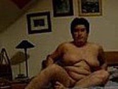 Well here's one more chubby mature mom taping herself during a masturbation session in this video clip. She fingers her pussy with as many fingers as she needs while showing off her enormous saggy tits