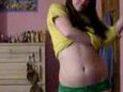 Young teen bedroom strip, yellow top and little green panties cast aside showing her little tits and pussy.
